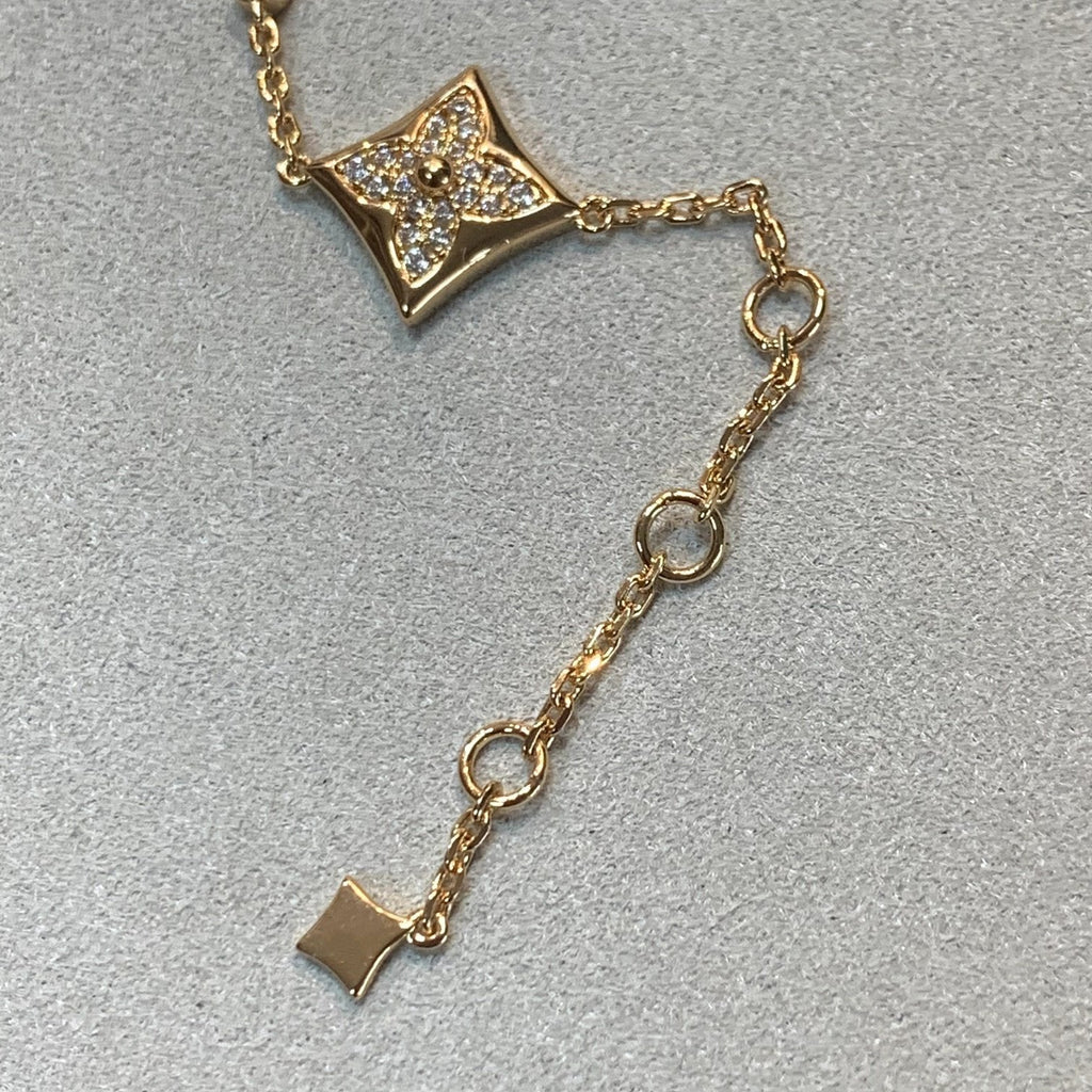 TimiSTAR AND SUN 4 MOTIFS GOLD DIAMONDS BRACELET