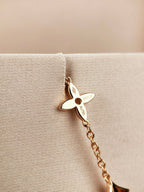 TimiSTAR AND SUN 7 MOTIFS GOLD BRACELET