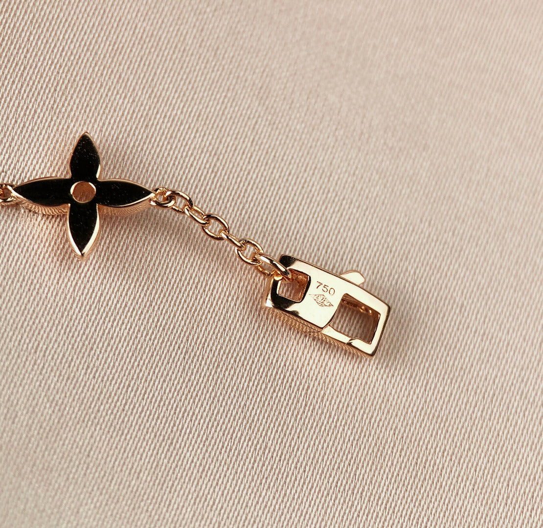 TimiSTAR AND SUN 7 MOTIFS GOLD BRACELET