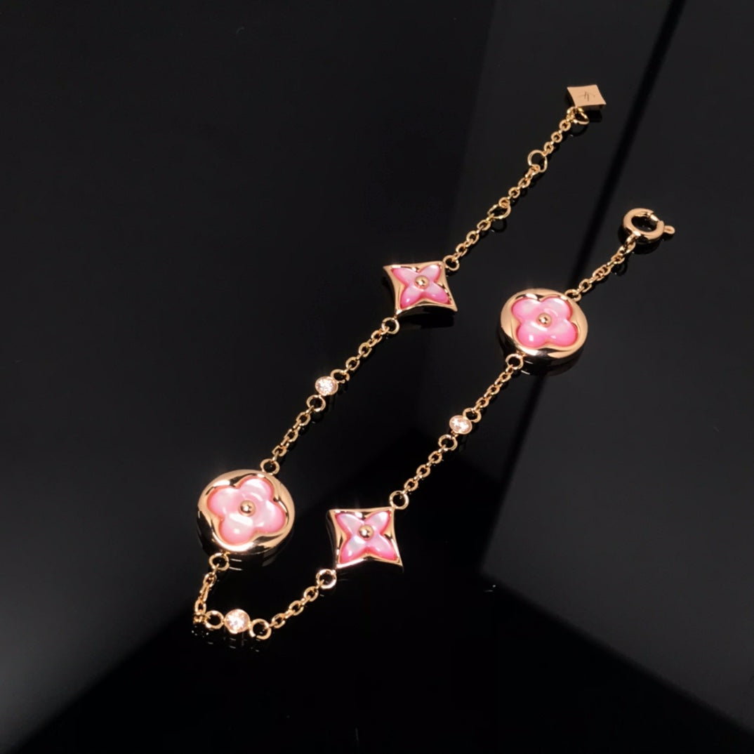TimiSTAR AND SUN 4 MOTIF PINK MOP PINK GOLD BRACELET