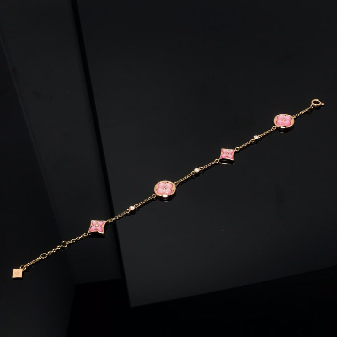 TimiSTAR AND SUN 4 MOTIF PINK MOP PINK GOLD BRACELET