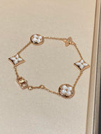 TimiSTAR AND SUN 5 MOTIF MOP PINK GOLD BRACELET