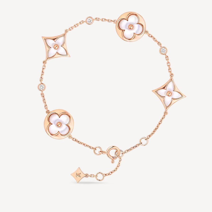 TimiSTAR AND SUN 4 MOTIF WHITE MOP PINK GOLD BRACELET
