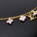 TimiLOGO 6 MOTIF STAR AND SUN GOLD BRACELET