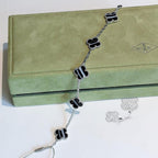 TimiCLOVER 5 MOTIF VEINED ONYX BRACELET SILVER